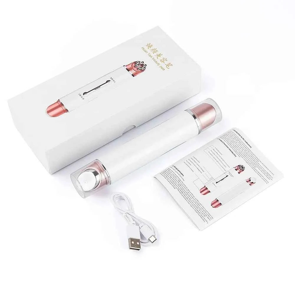 White and rose gold beauty device with packaging, USB cable, and user manual on a white background