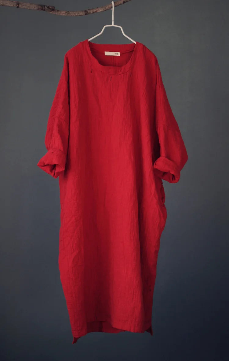 Red dress hanging on a gray background