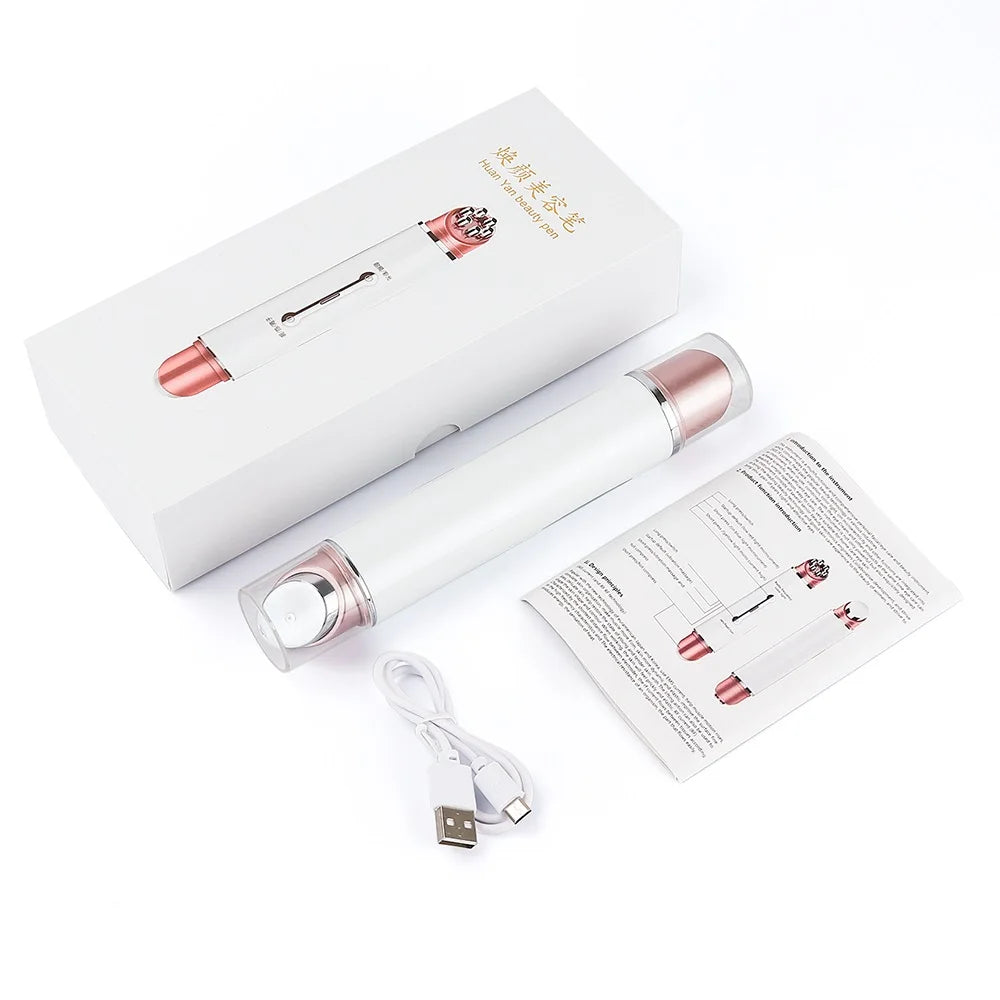 White and rose gold beauty device with packaging, USB cable, and user manual on a white background