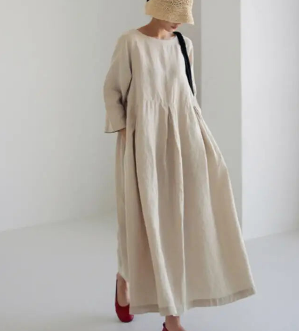 Cotton long dress with gathered skirt, pockets, round neck, long sleebe beige color.