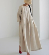 Cotton long dress with gathered skirt, pockets, round neck, long sleebe beige color.