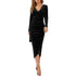 Black velvet dress with long sleeves on a white background
