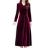 Maroon velvet dress worn by a model on a white background